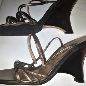 Stuart Weitzman bronze wedge heels.
